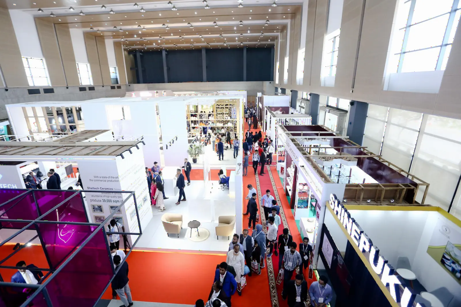 Overhead view of a busy international exhibition hall